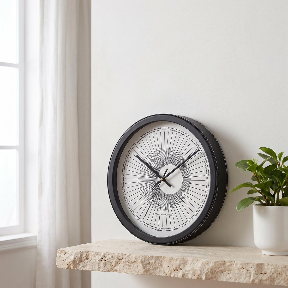 Spaces Unhooked Round Wall Clock, Sunburst Line Art Dial, Black Frame