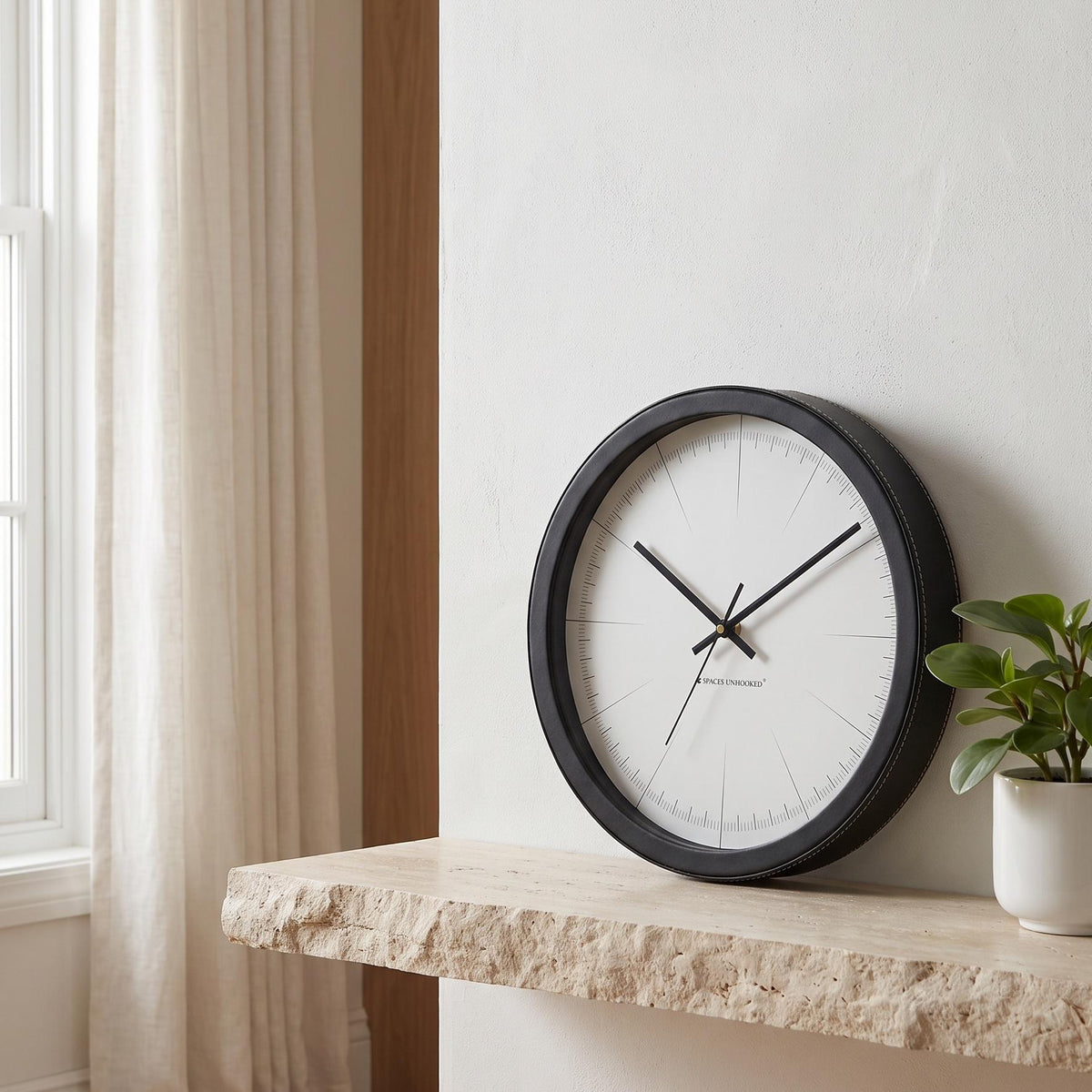 Spaces Unhooked Minimalist Round Wall Clock, No Numerals, Black Frame