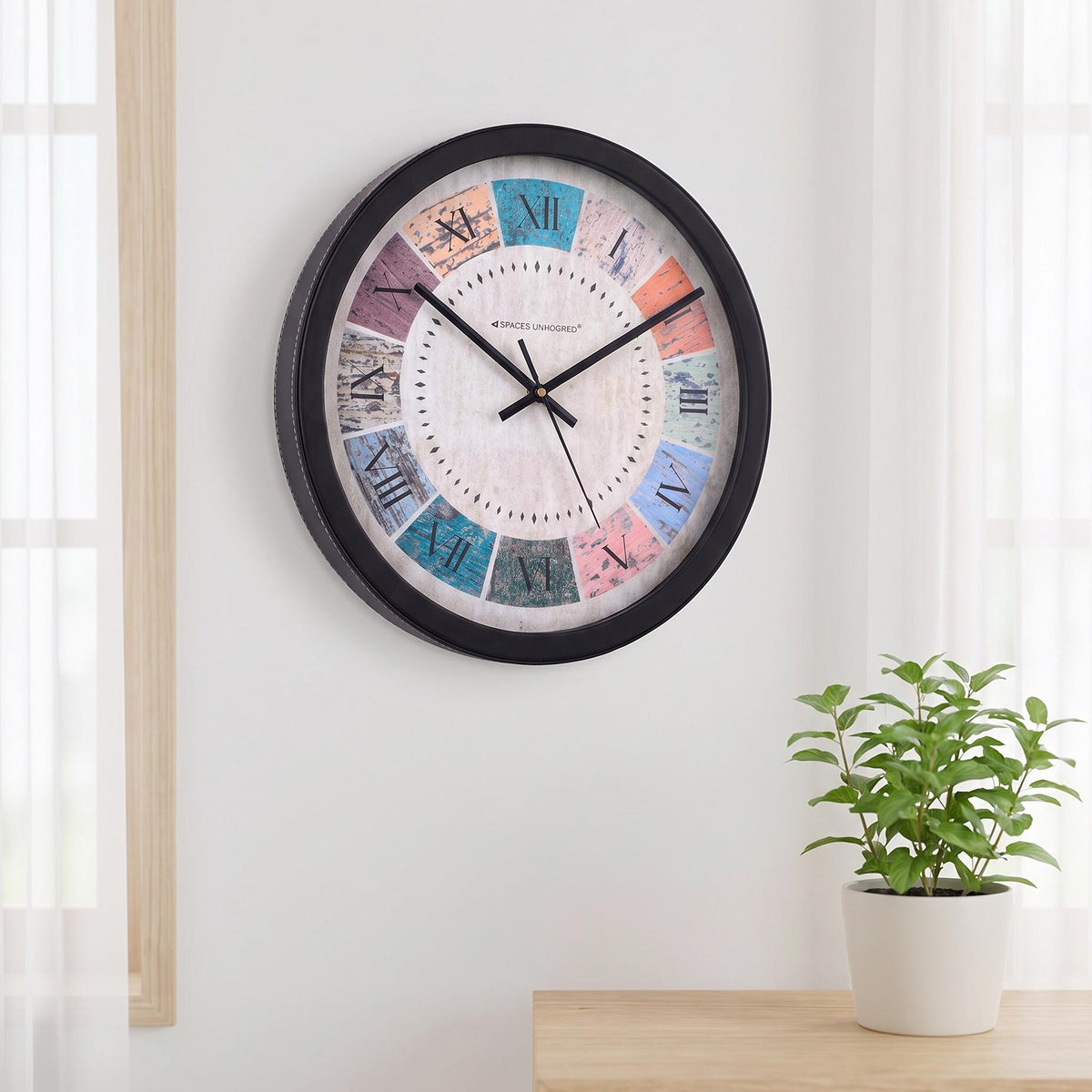 Spaces Unhooked Colourful Roman Numeral Round Wall Clock