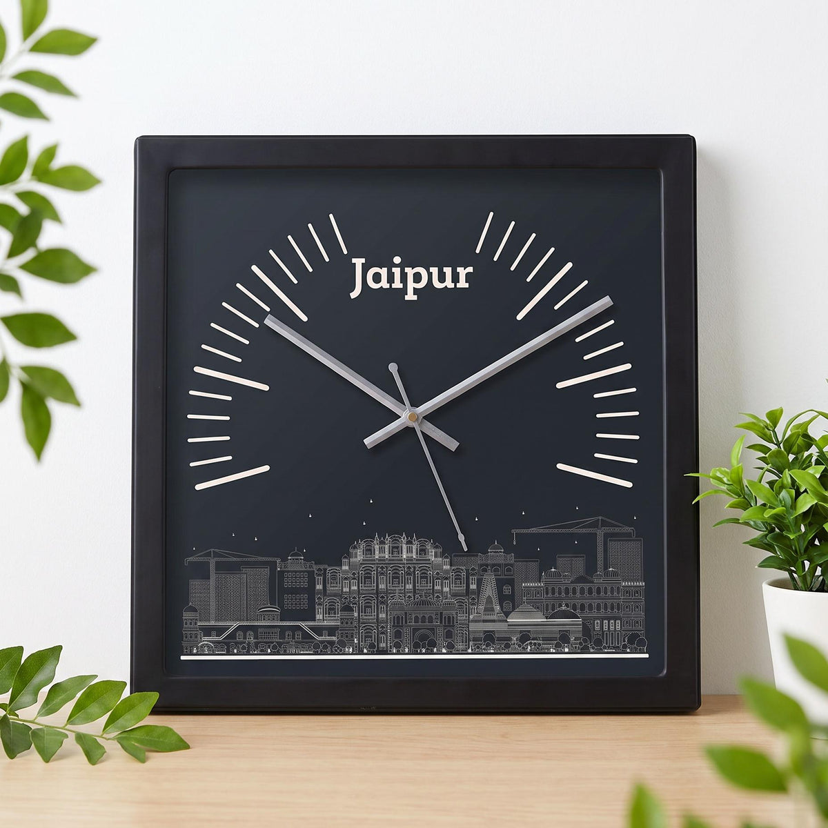Jaipur skyline wall clock on a dining room wall beside a sideboard