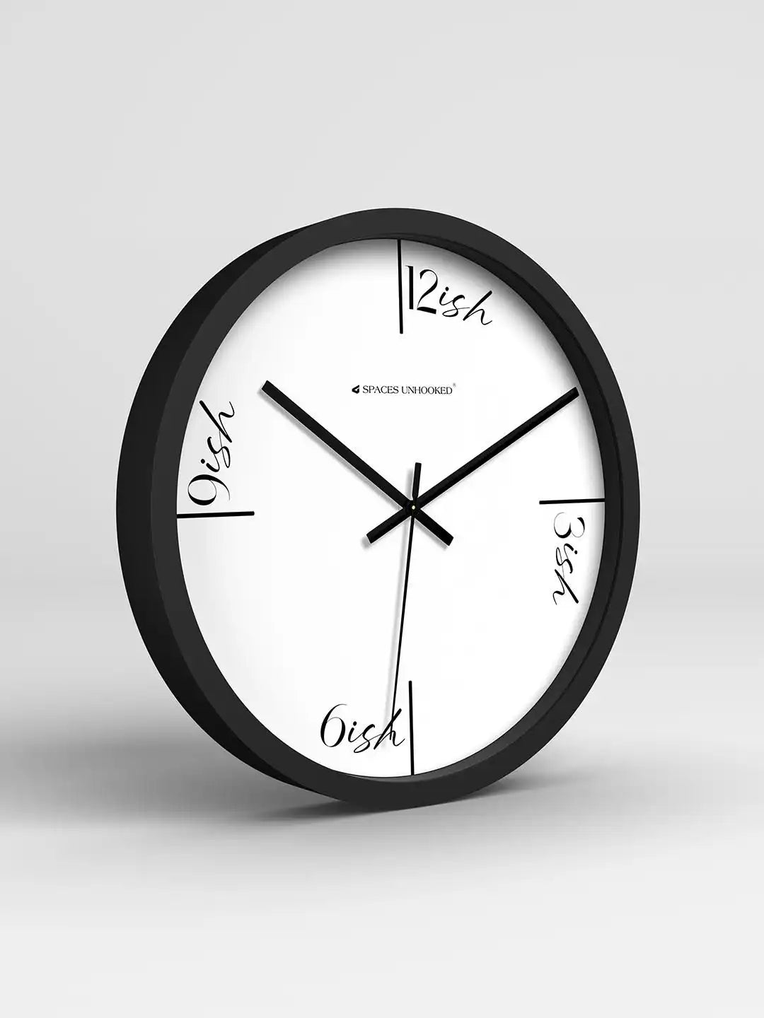 Black and white wall clock on a light gray background