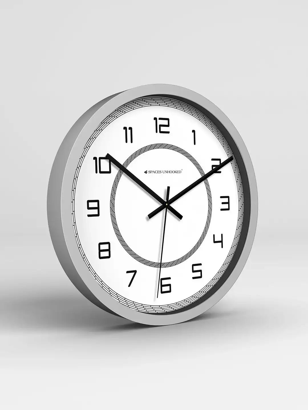 Wall clock with black hands and numbers on a white background