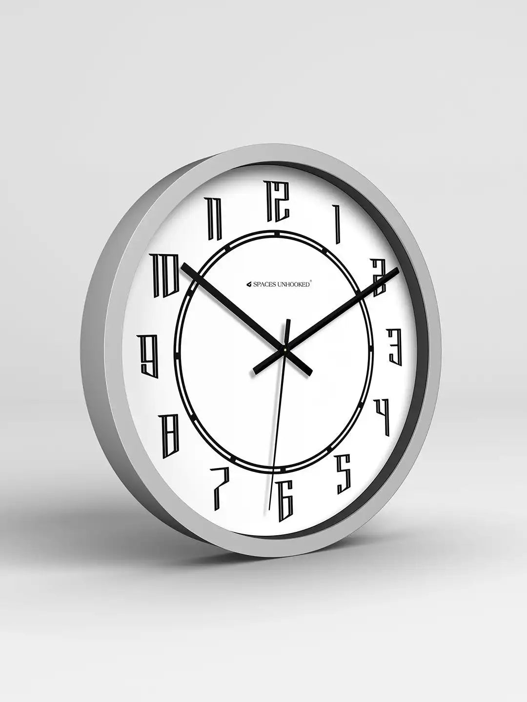 Wall clock with black Roman numerals on a white background