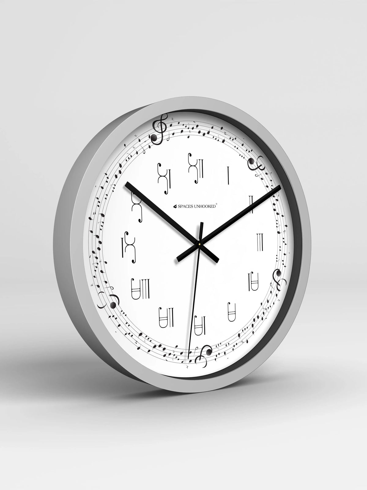 Wall clock with musical notes and symbols on a white background
