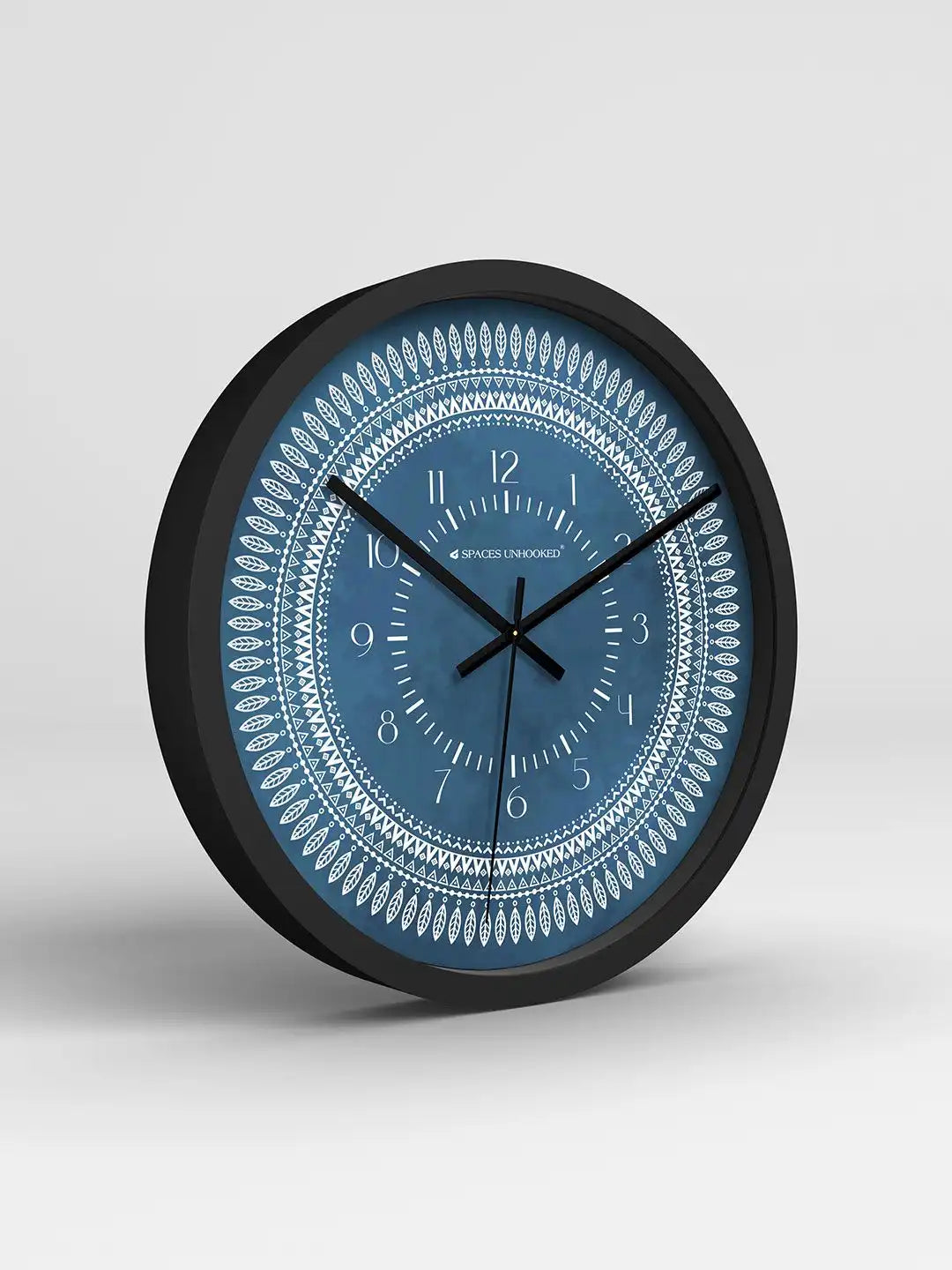 Grey – Premium wall clock in black frame shown at angled 3D view with mandala dial