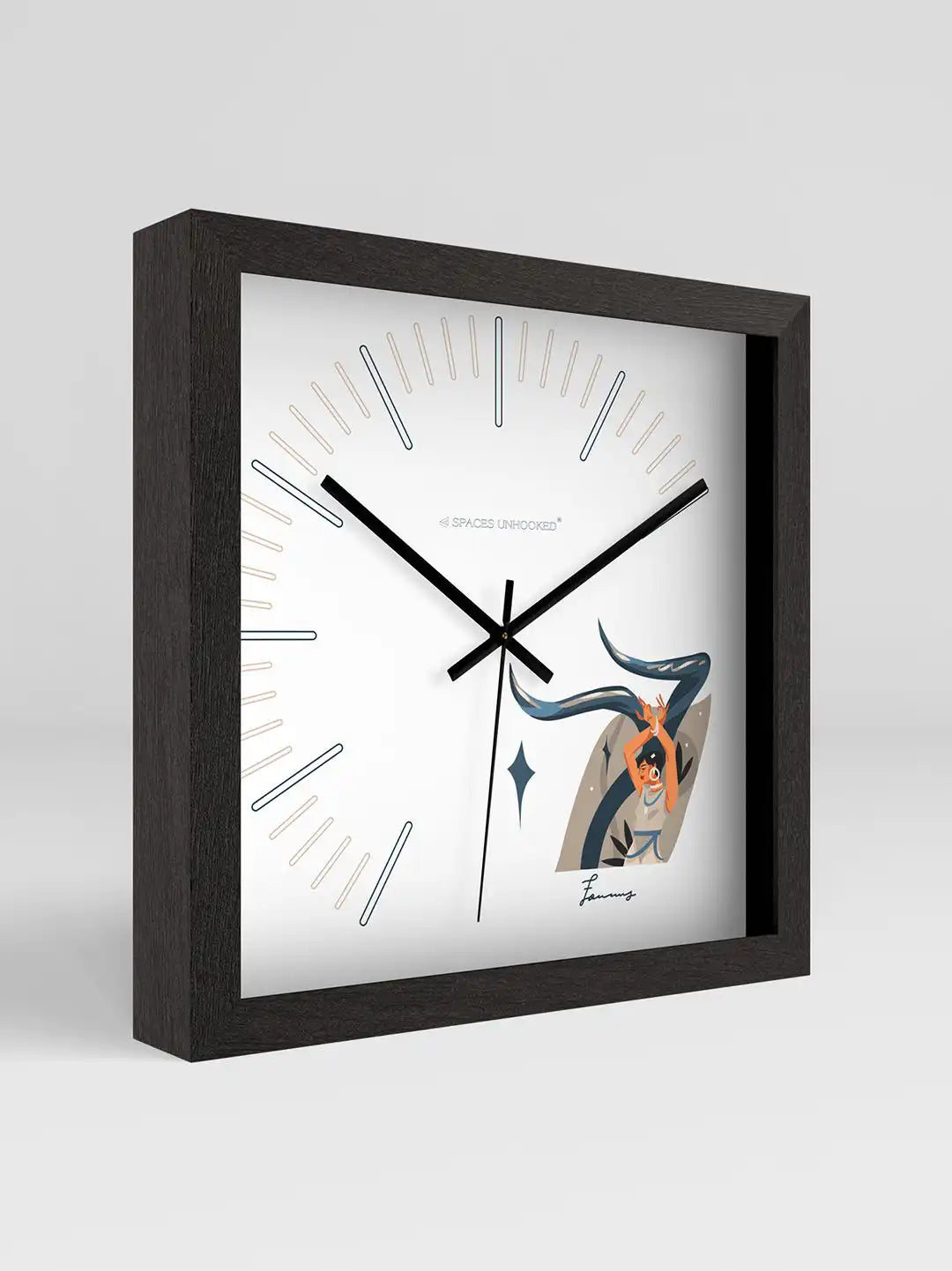Close-up view of a black-framed square wall clock featuring a minimalist dial and artistic dancer illustration on a white background.