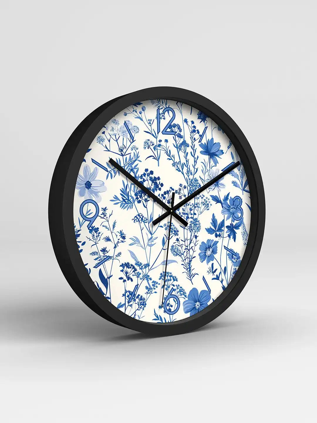 Grey – Premium wall clock in black frame shown at angled 3D view with floral print
