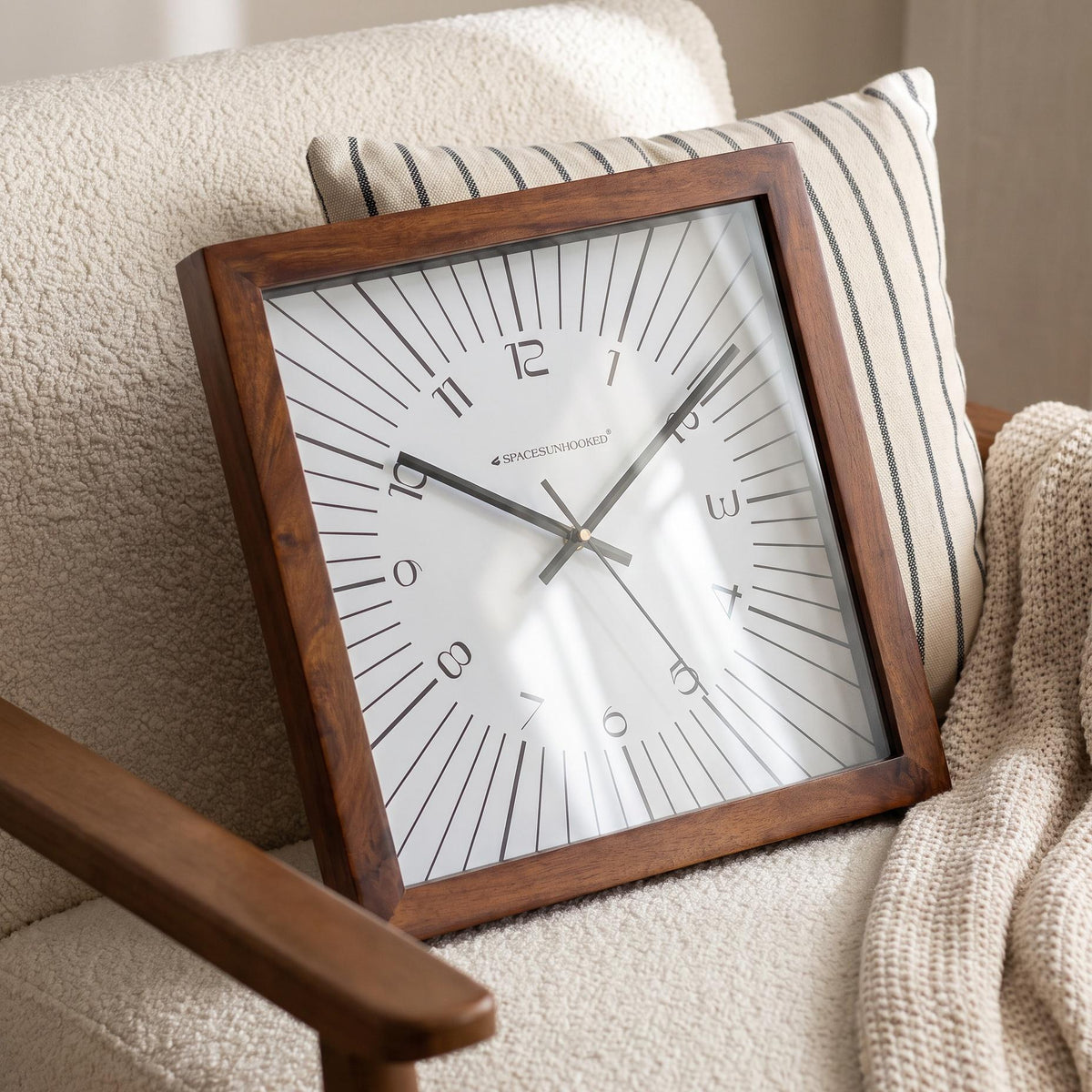 Warm brown square wooden frame with natural grain and even border, close-up view