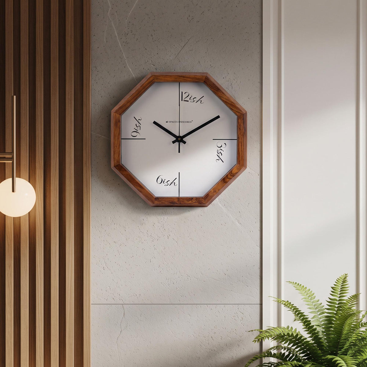 Black hour and minute hands over a clean white dial with long divider lines