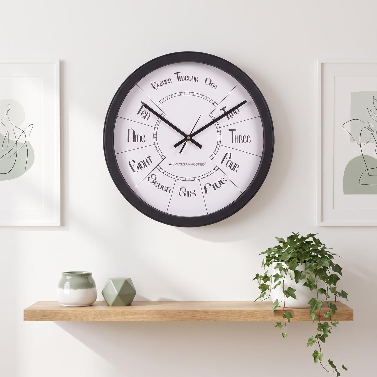 Spaces Unhooked Round Wall Clock, Number Words Dial, Black Frame
