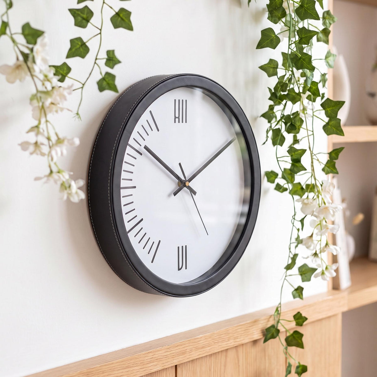 Spaces Unhooked Minimalist Roman Numeral Round Wall Clock