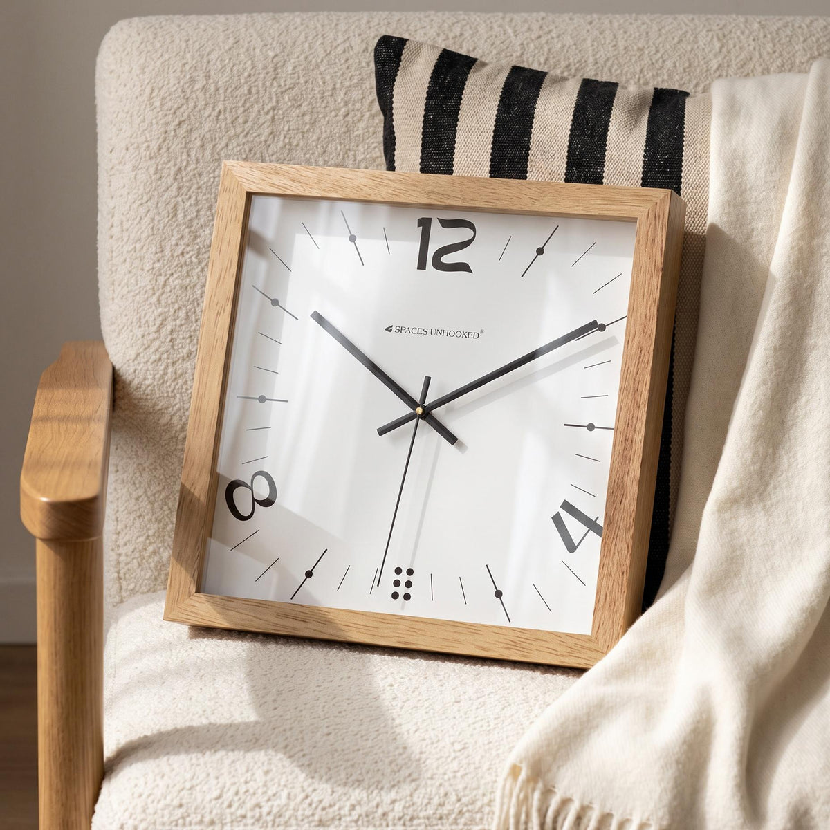 Light natural oak square wooden frame with soft visible grain and clean corners, close-up