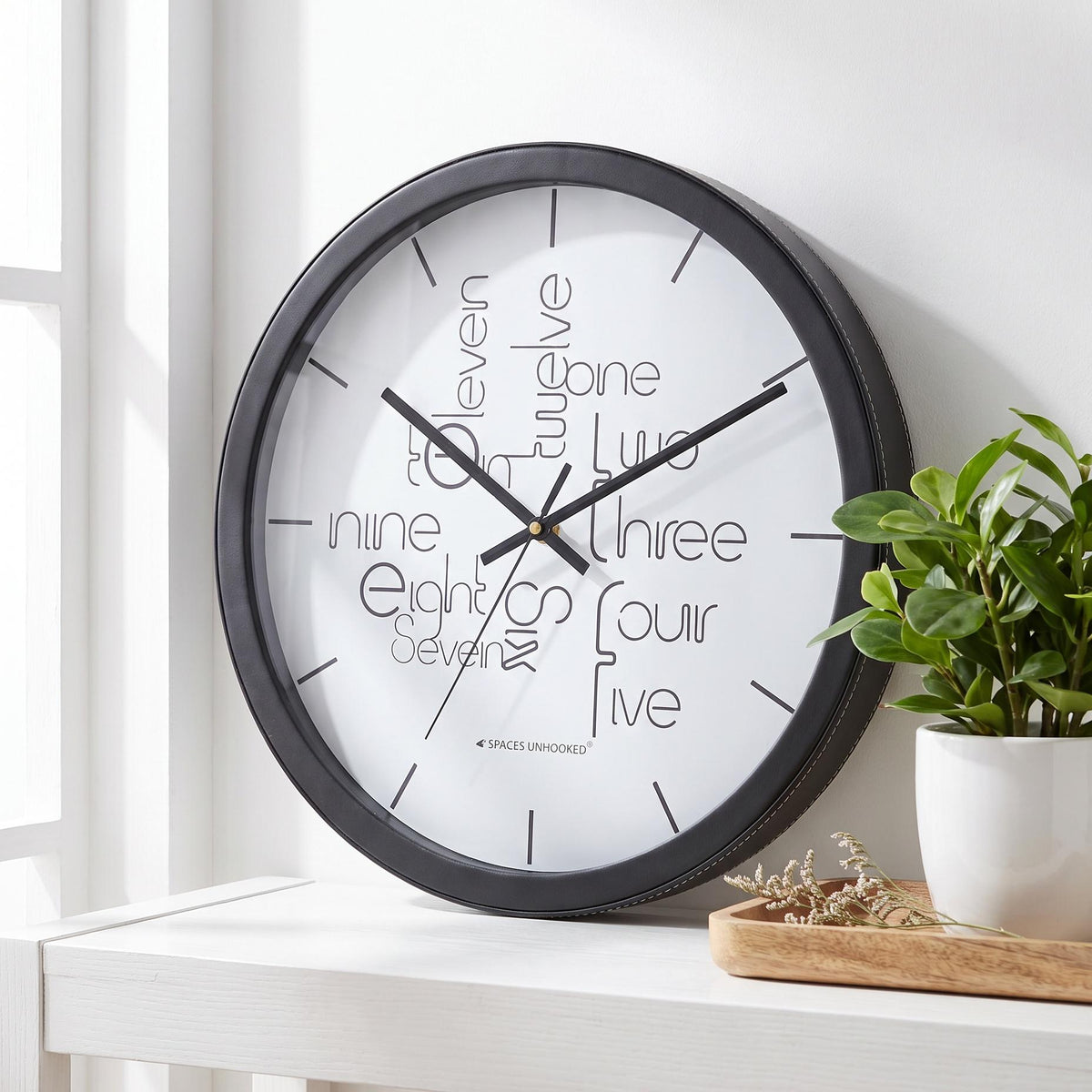 Spaces Unhooked Round Wall Clock, Typography Number Words, Black Frame