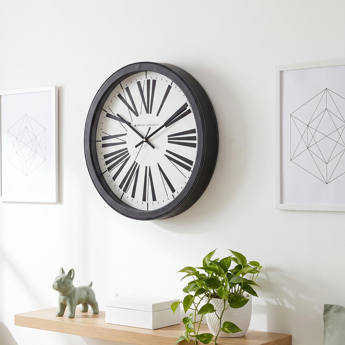 Spaces Unhooked Round Wall Clock, Tapered Roman Numerals, Black Frame