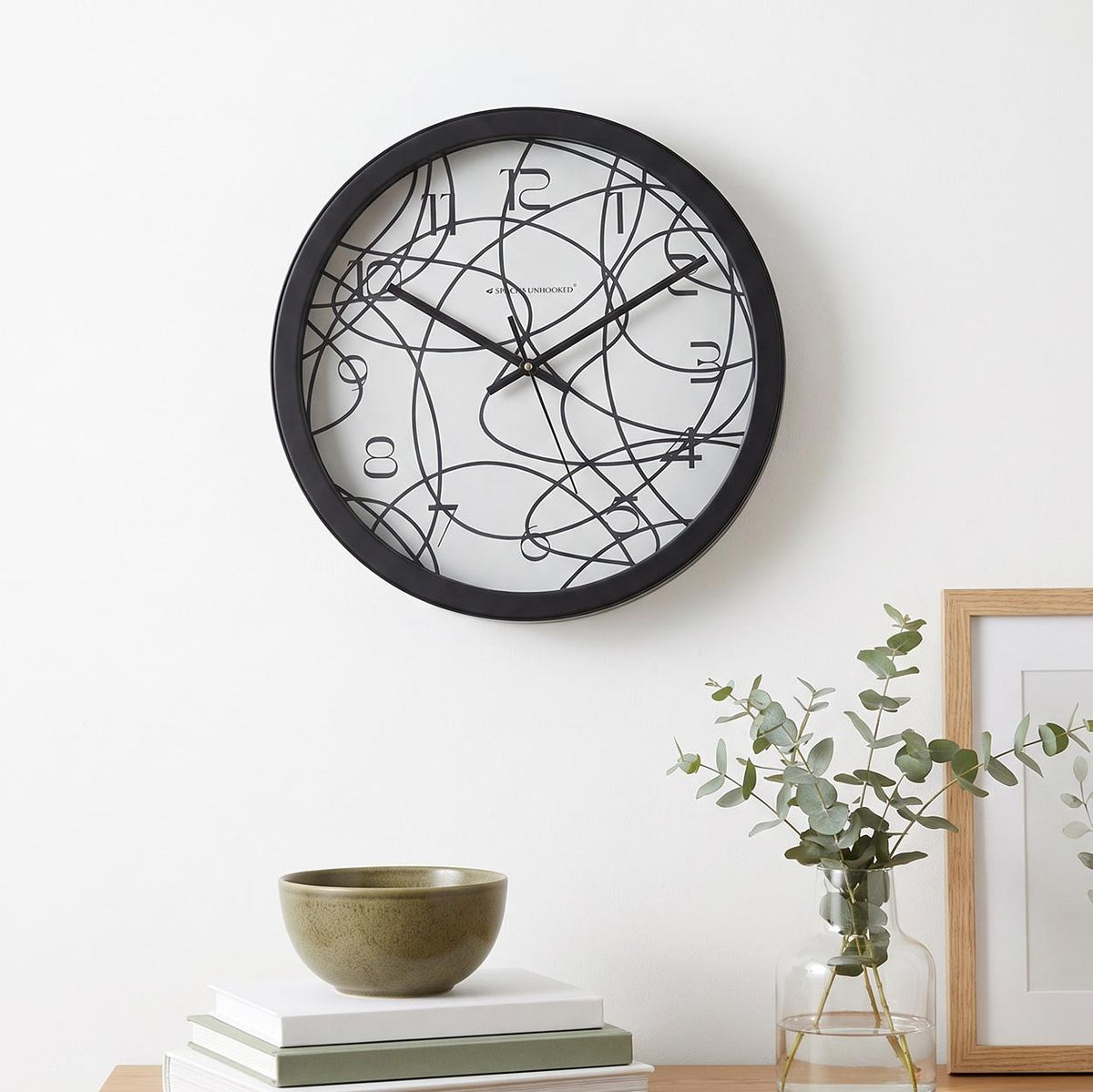 Spaces Unhooked Abstract Line Art Round Wall Clock, White Dial