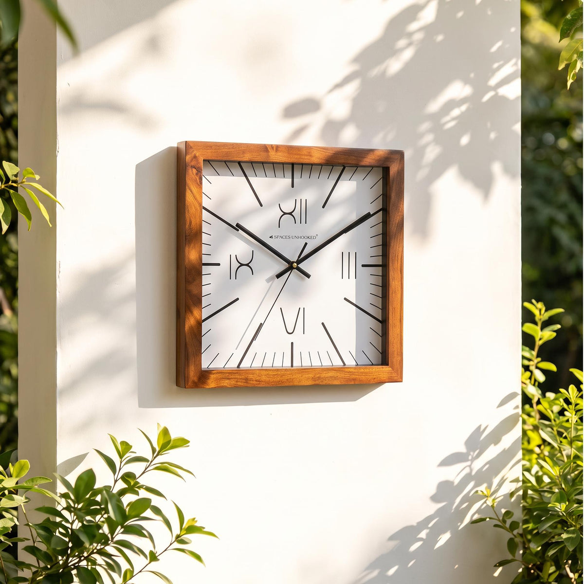 Long tapering line markers and fine minute ticks on a square wooden wall clock dial