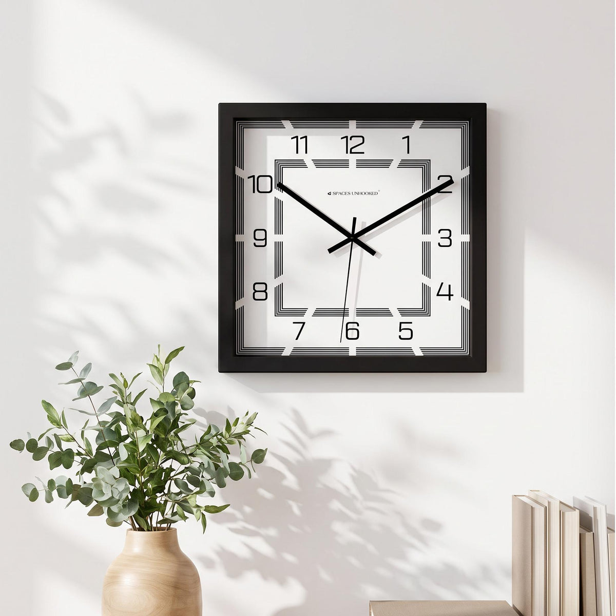 Spaces Unhooked logo above the brass-toned centre cap on an art deco dial