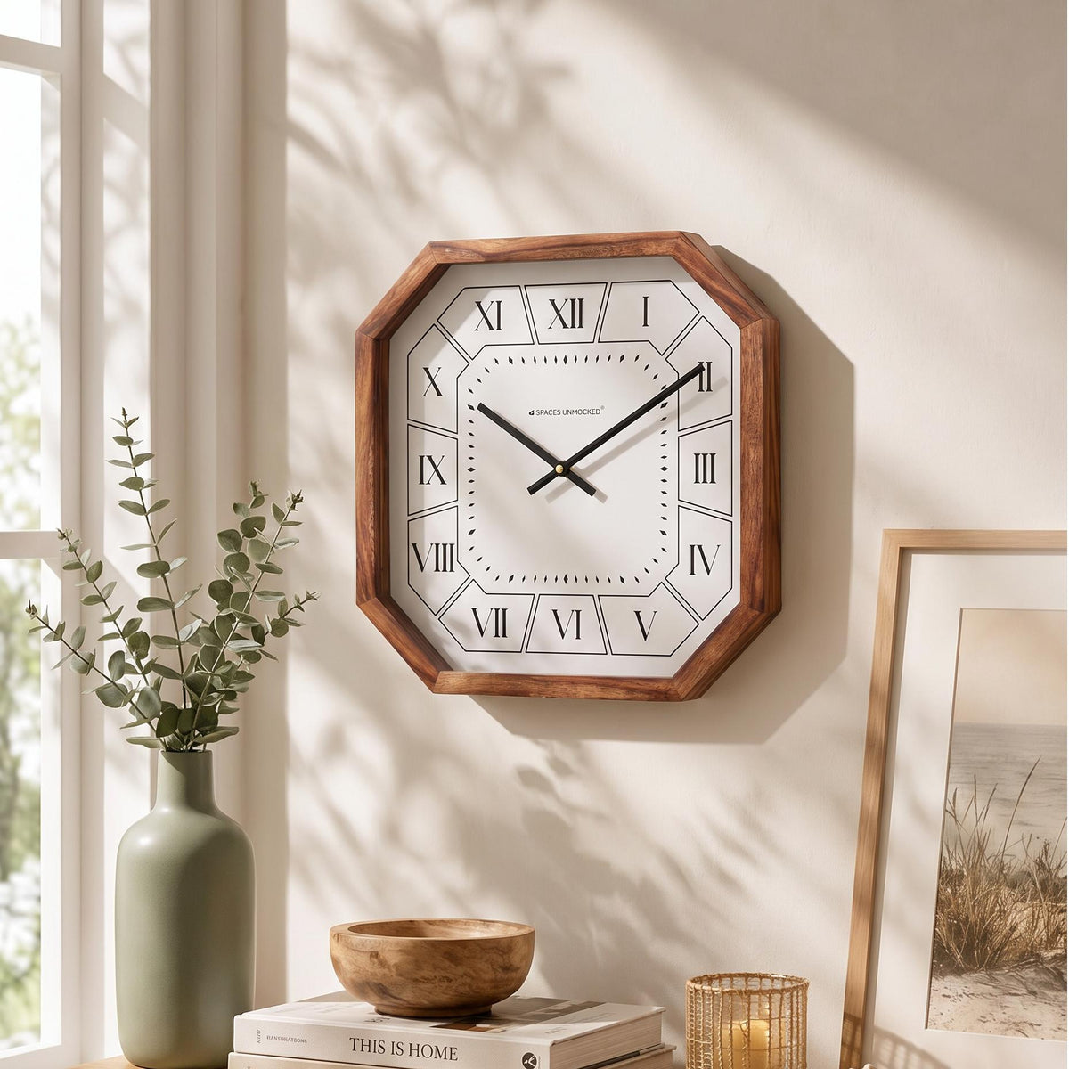 Rich brown octagonal wooden frame with visible grain on a Roman numeral wall clock, close-up