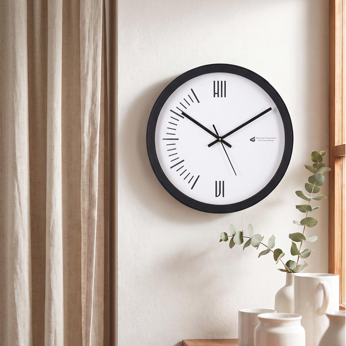 Spaces Unhooked Minimalist Roman Numeral Round Wall Clock