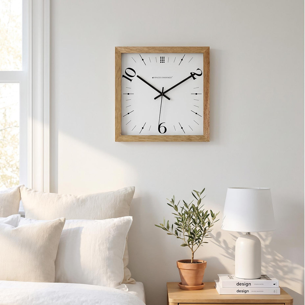Dot cluster at the top in place of the 12 on a minimal oak square wall clock dial
