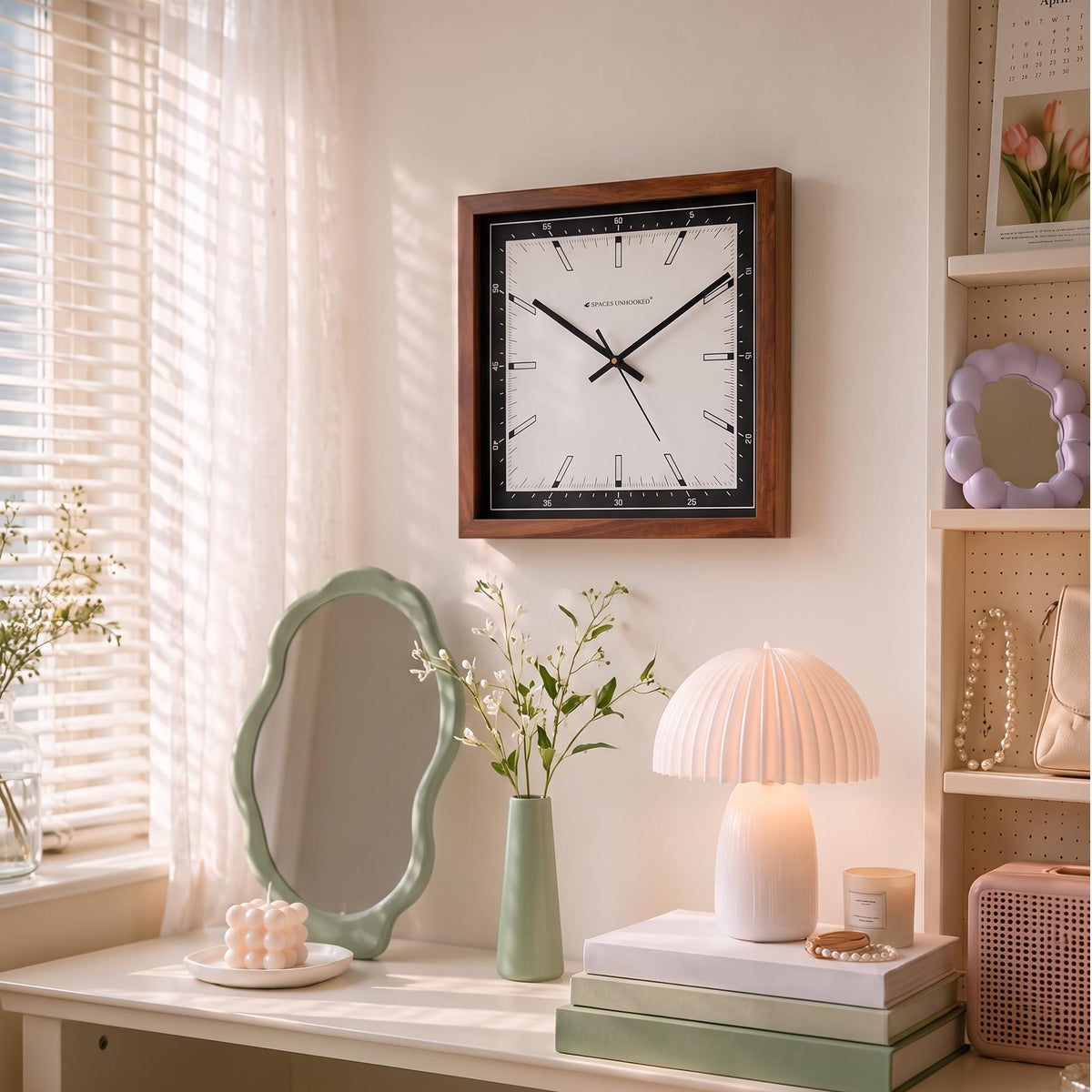Warm brown wooden frame with natural grain around a black bezel on a square wall clock