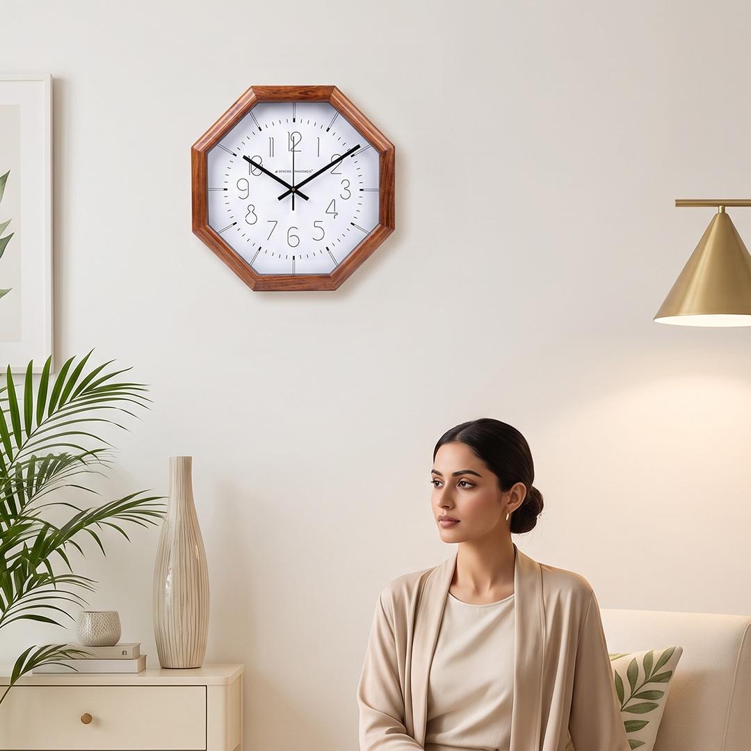 Close-up of fine single-line numerals, minute ticks and hour dashes on a white clock dial