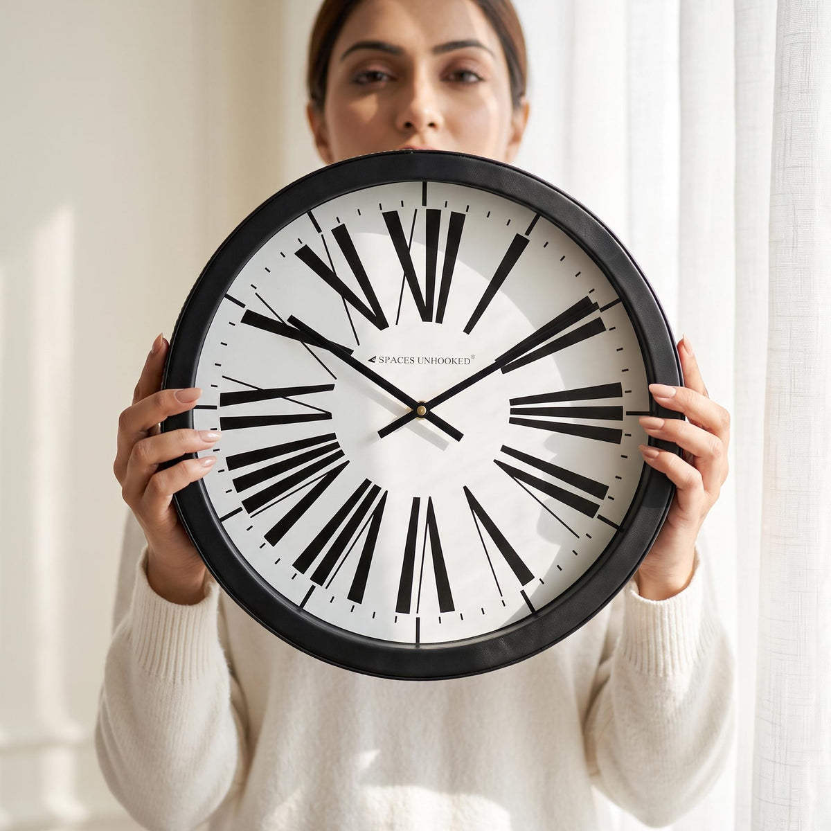 Spaces Unhooked Round Wall Clock, Tapered Roman Numerals, Black Frame