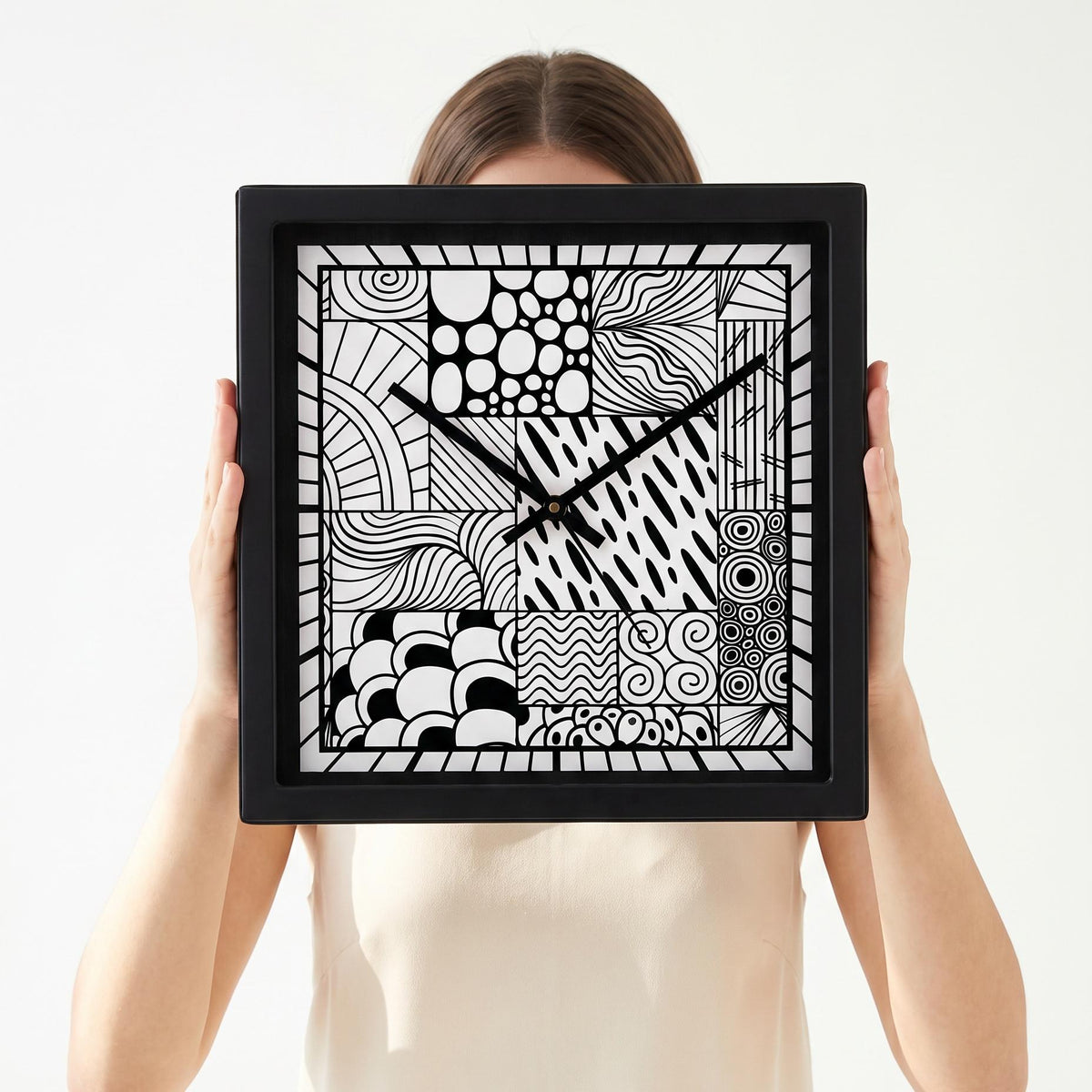Doodle art wall clock above a feature wall above a sofa