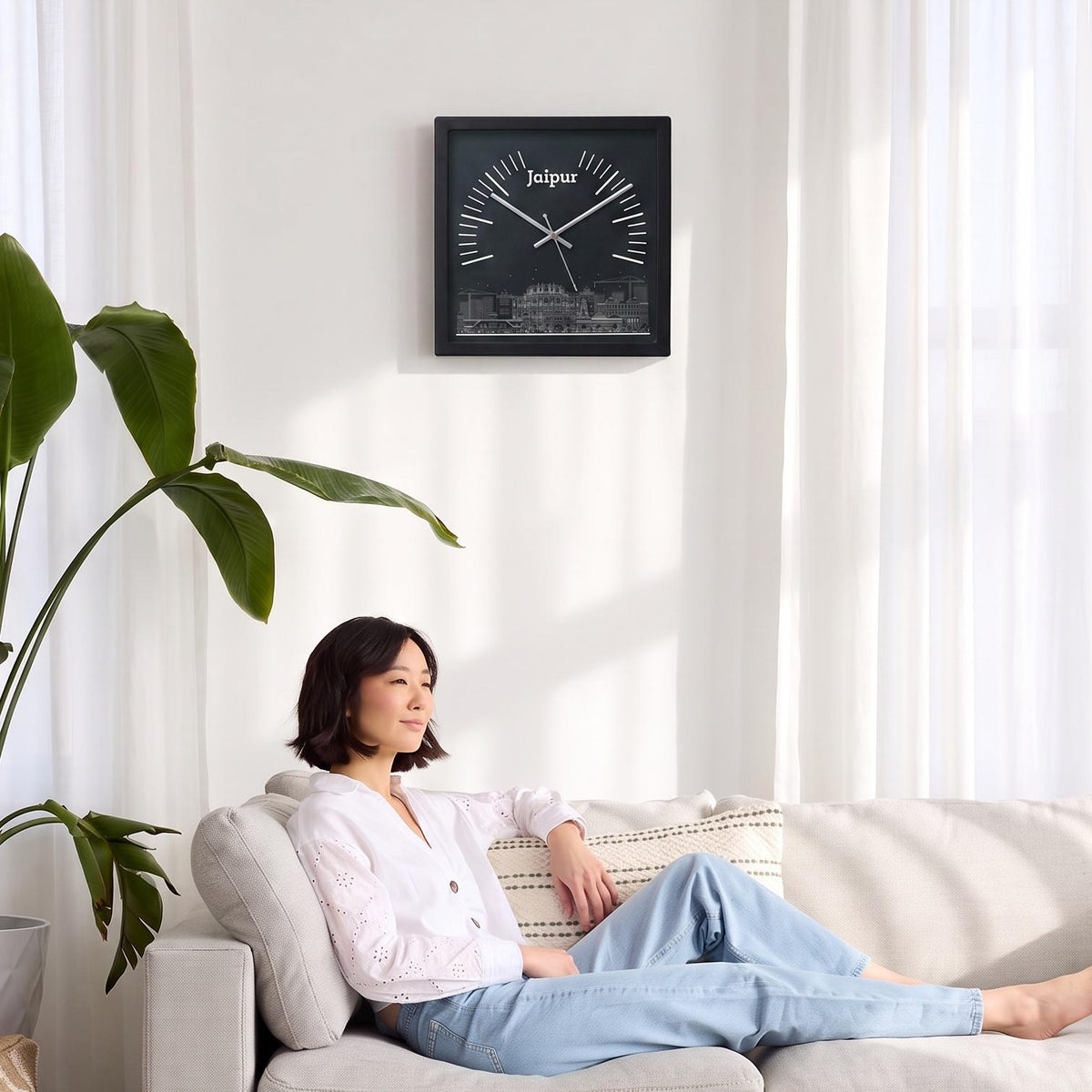 Jaipur skyline wall clock above a living room wall above a console table