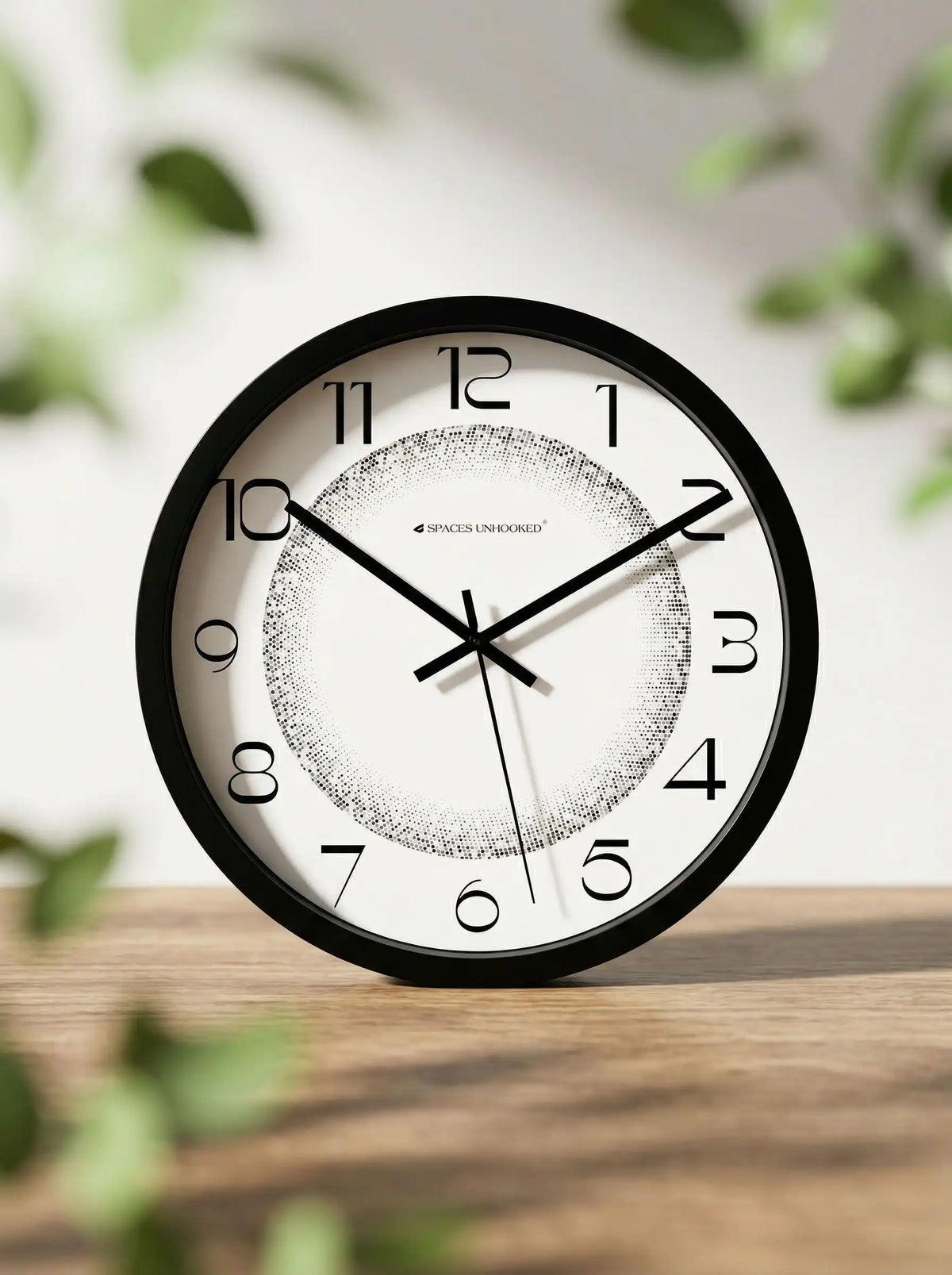 Lifestyle AI View – Premium Silent Wall Clock on Wooden Table with Green Leaves