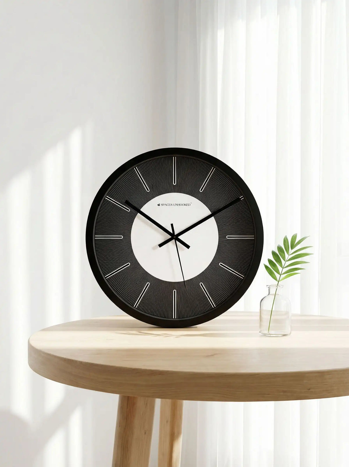 Lifestyle AI – Designer wall clock placed on wooden side table with plant