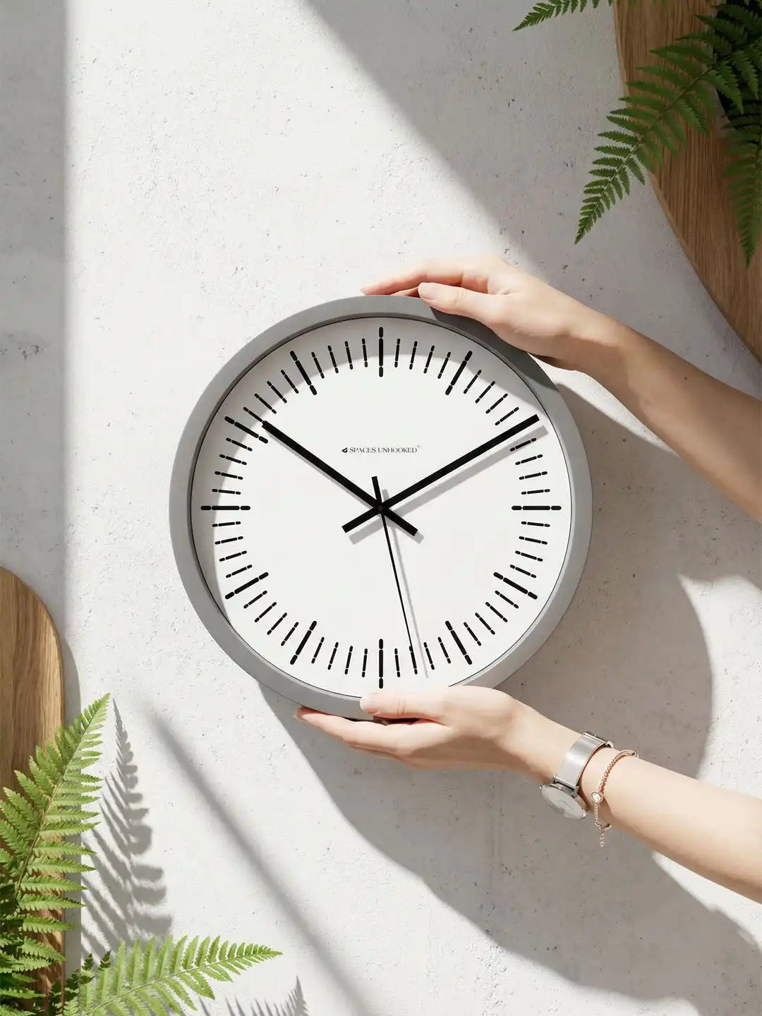 Lifestyle AI – Designer wall clock placed against plain backdrop with shadow play