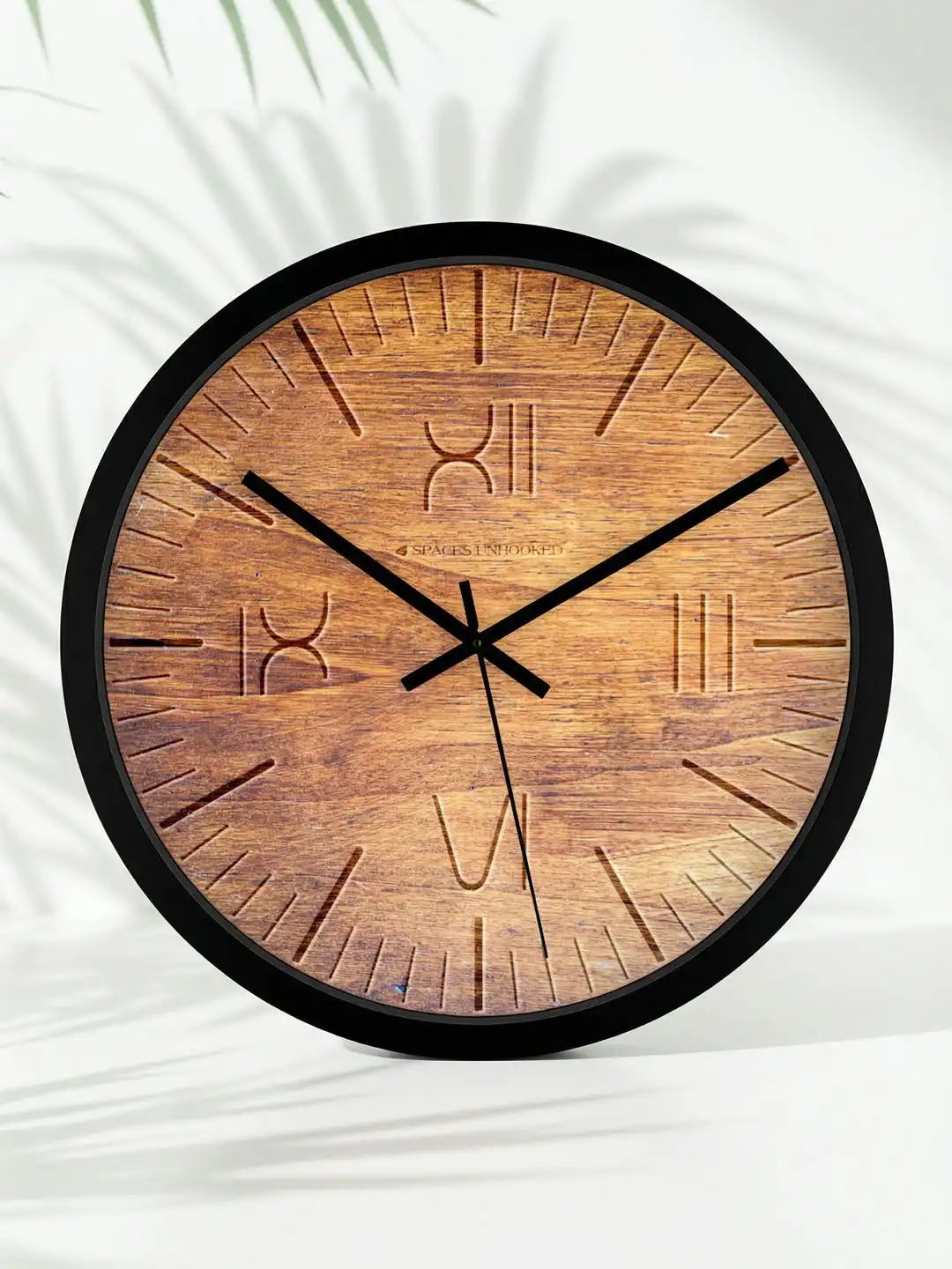 Lifestyle AI – Designer wall clock placed against palm leaf shadow backdrop