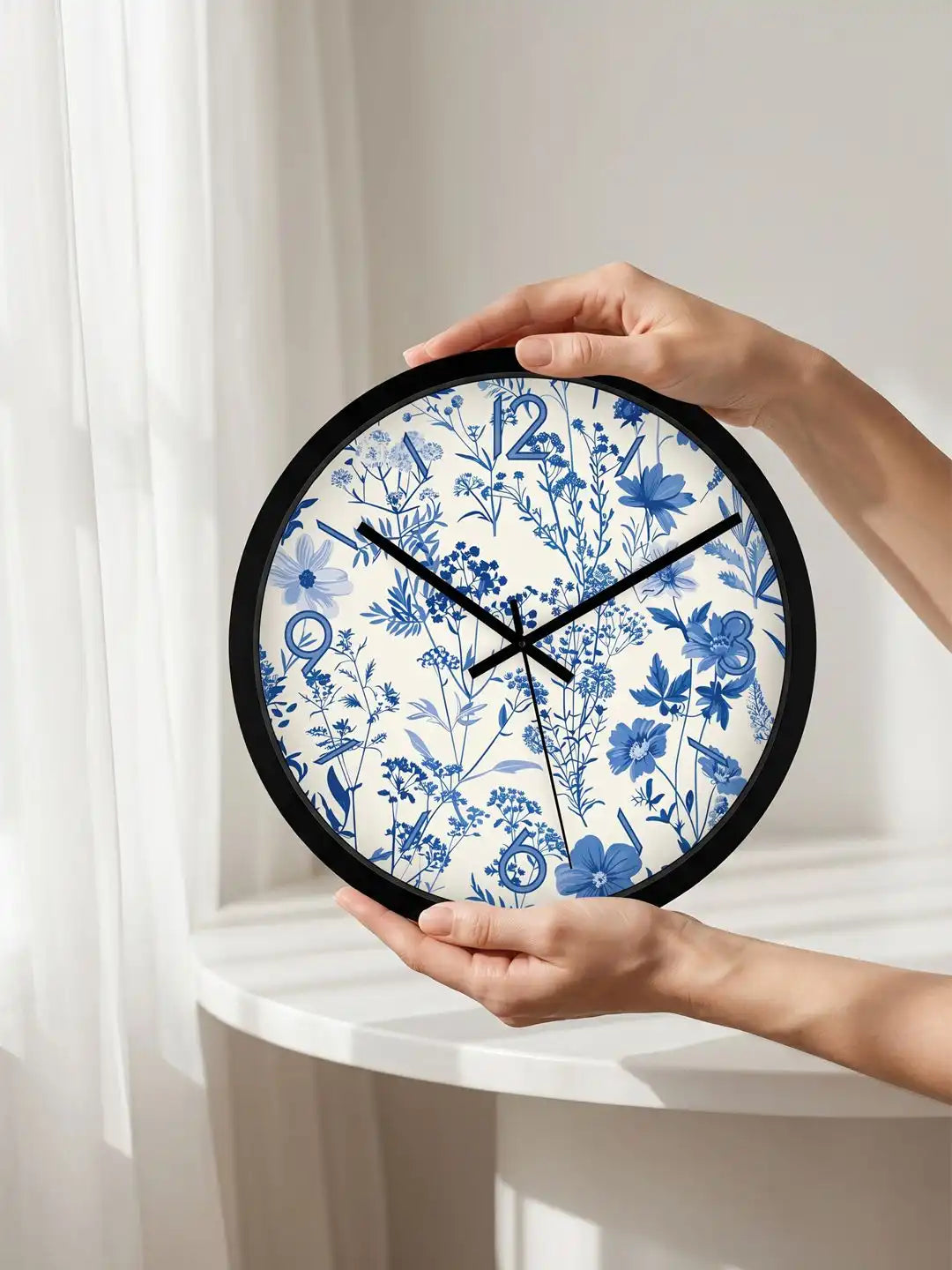 Lifestyle AI – Designer wall clock being held by hands near curtain backdrop