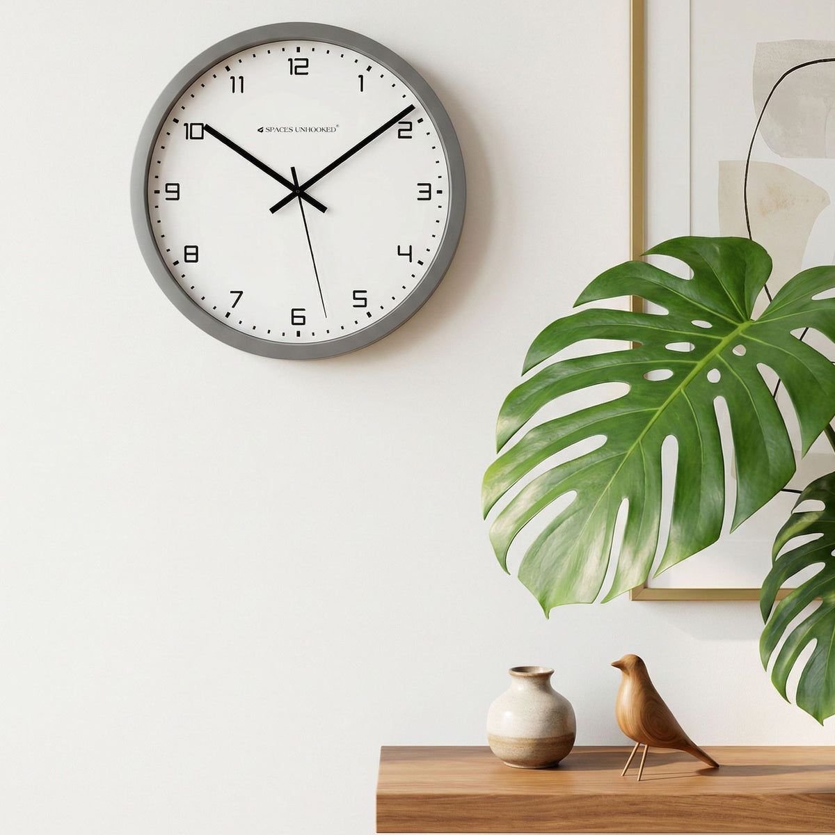 Right side view round silver wall clock depth profile – Spaces Unhooked decorative silent wall clock