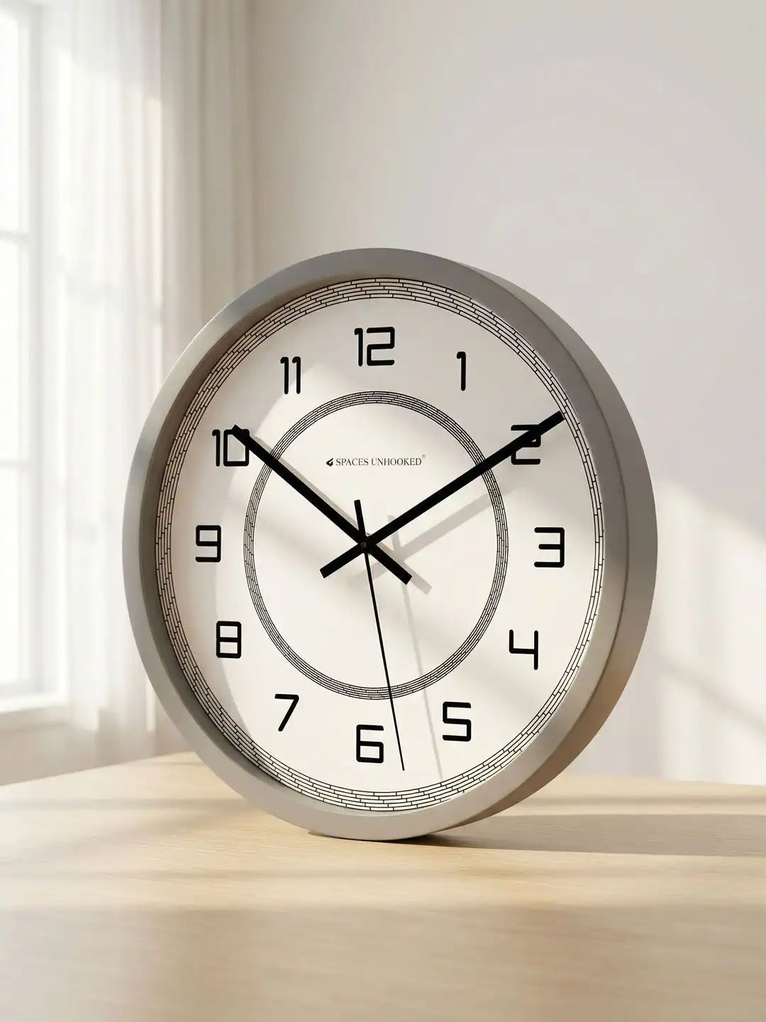 Lifestyle Wall Clock on Wooden Table – Grey Frame Circle Texture Dial Designer Wall Clock for Home