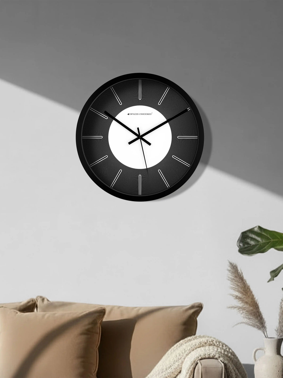 Lifestyle M – Silent wall clock mounted above sofa in modern living room decor