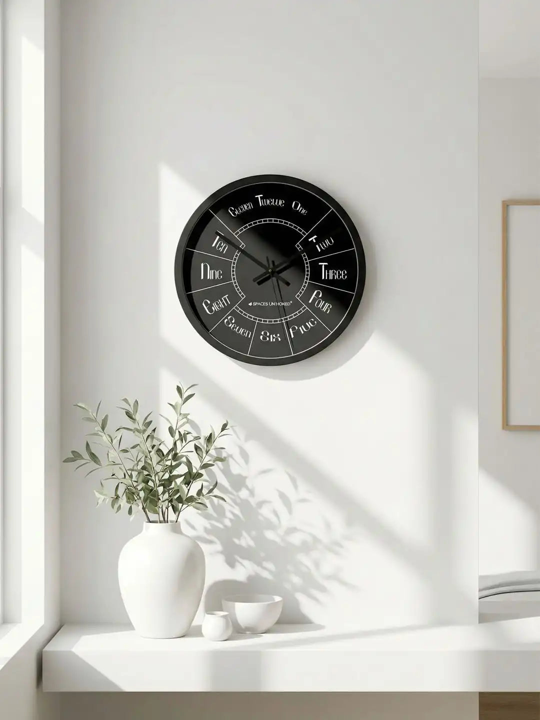 Lifestyle M – Silent wall clock mounted on wall above vase and bowls decor