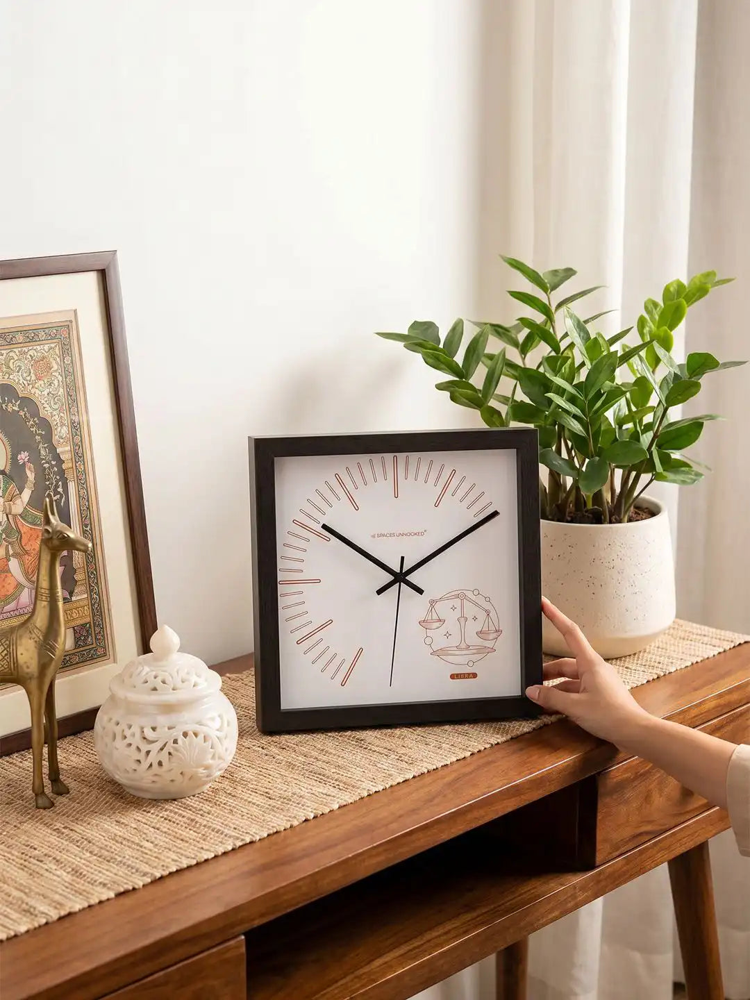 Square Dark Wood Frame Wall Clock with Copper Libra Scales Design on Wooden Console Table - Wooden Wall Clock for Living Room