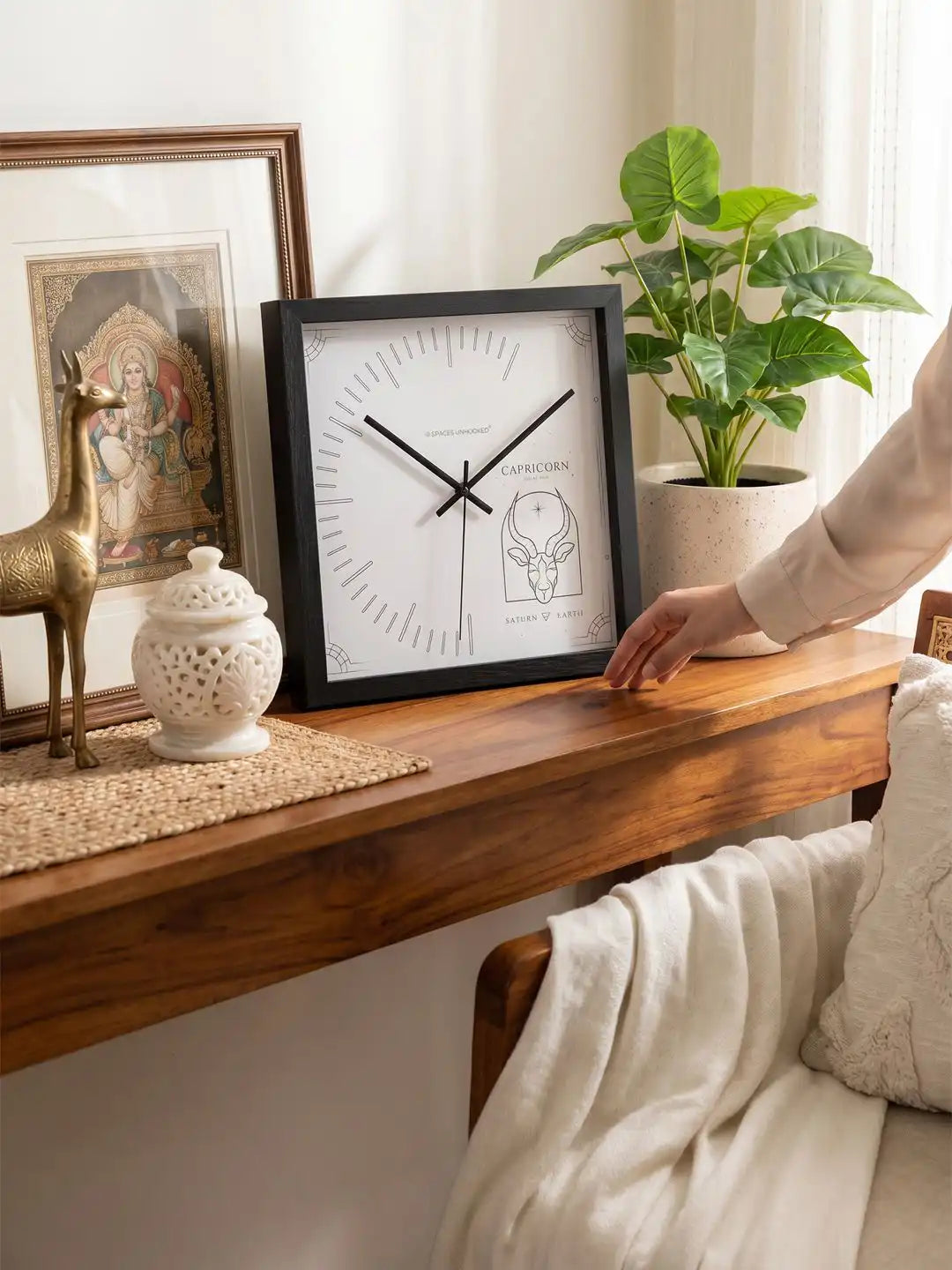 Square Dark Wood Frame Wall Clock with Silver Capricorn Sea Goat Design on Wooden Console - Wooden Wall Clock for Living Room