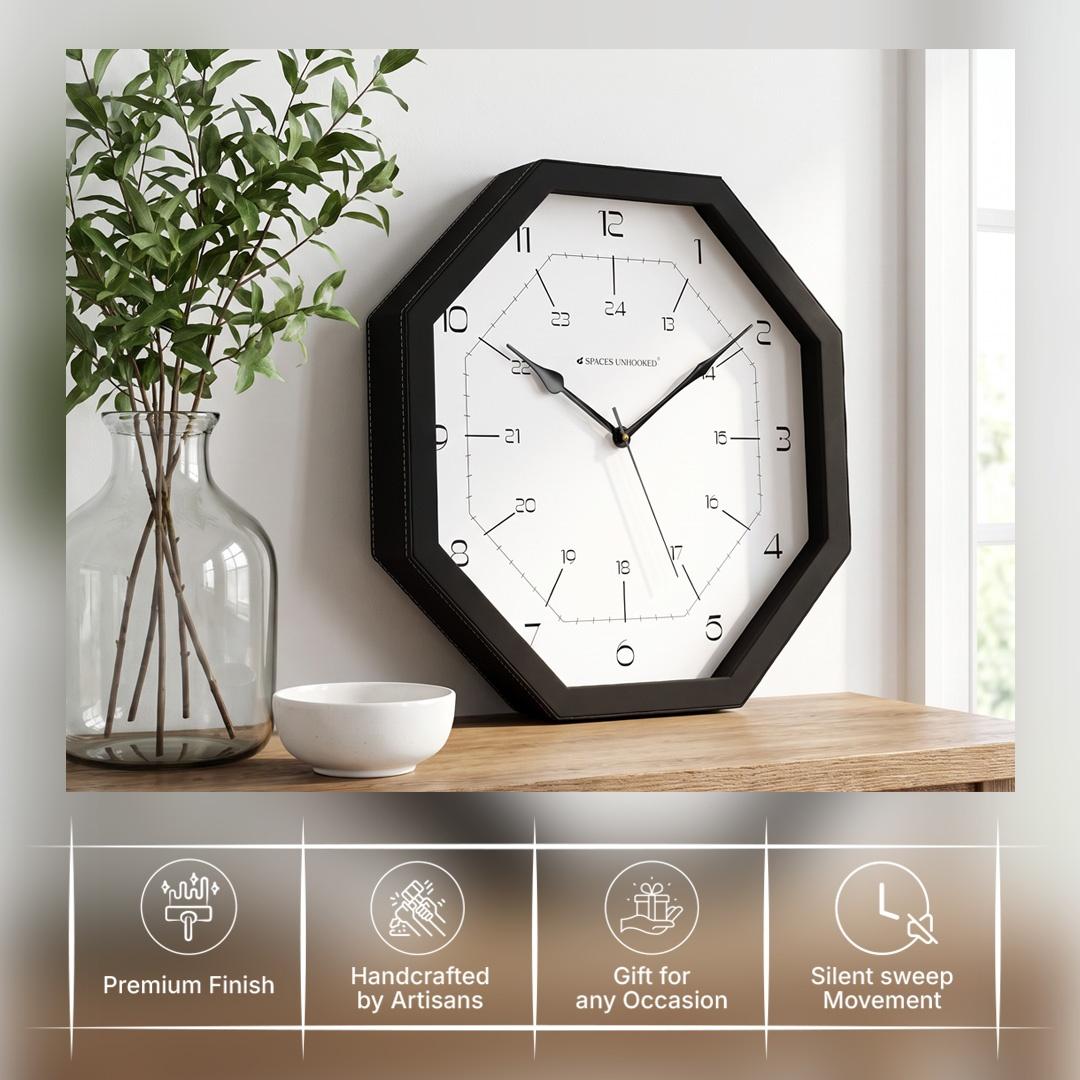 Sculpted black hour and minute hands over fine minute ticks on an octagonal dial