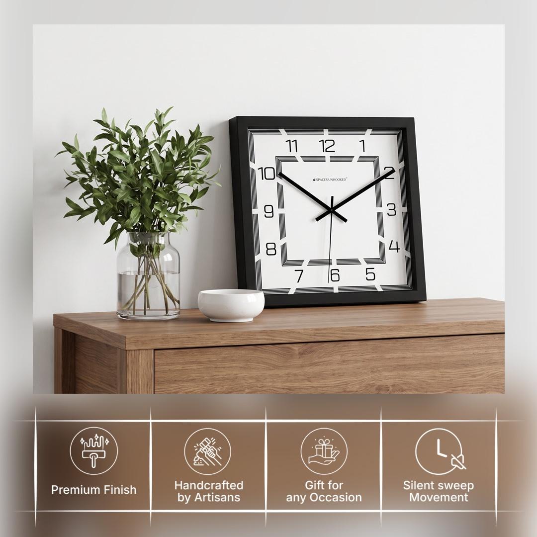 Art deco square wall clock on a feature wall above a living room sideboard
