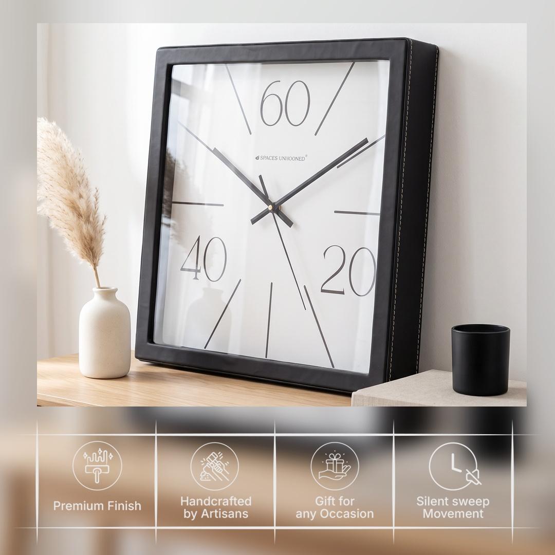 Black hour and minute hands with a thin second hand over radiating lines on a white dial