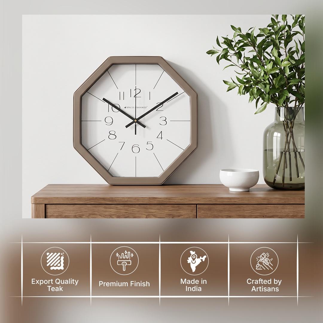 Taupe and white octagonal wall clock in a home office or studio apartment with cane decor