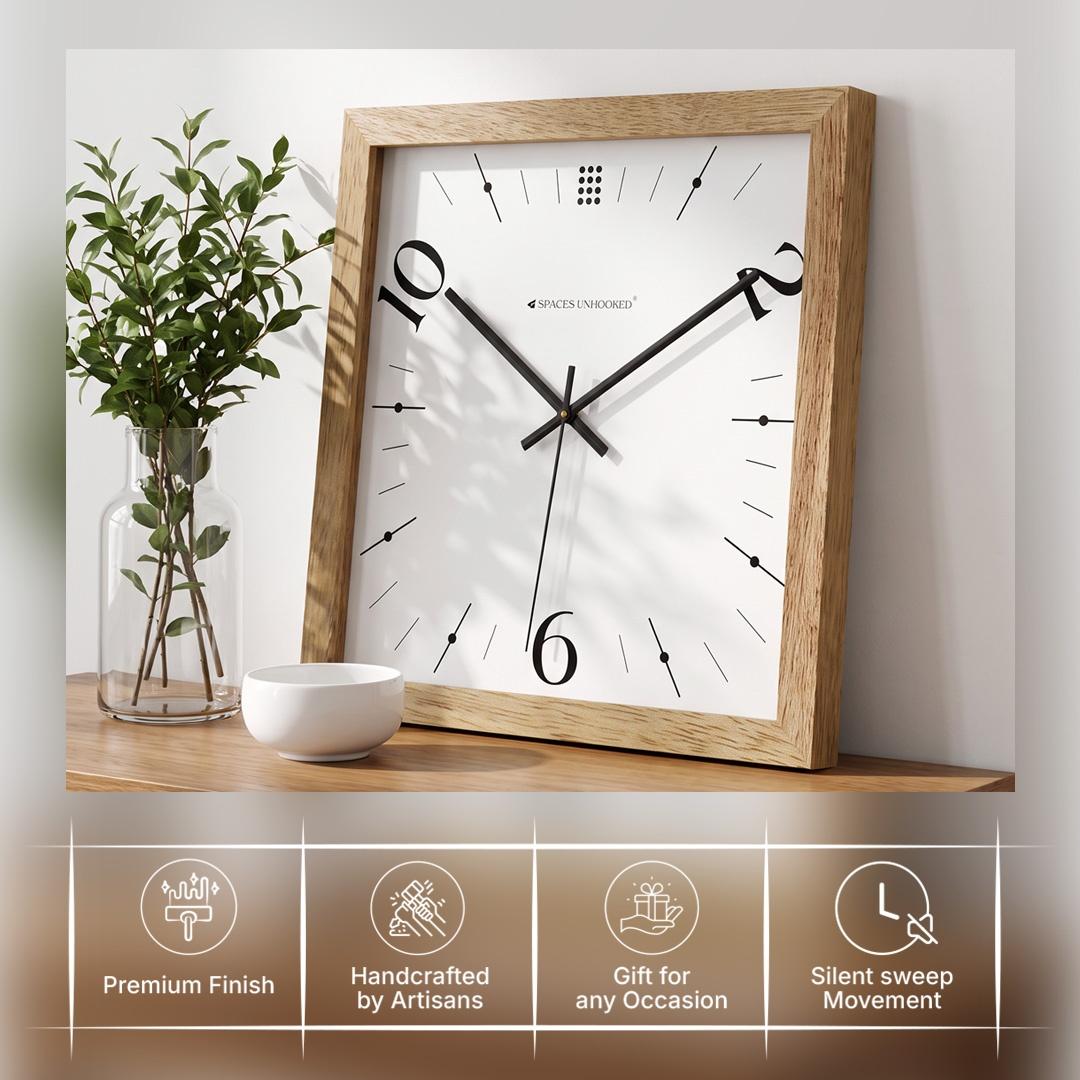 Light oak wooden wall clock in a bedroom or hallway with linen and simple ceramics