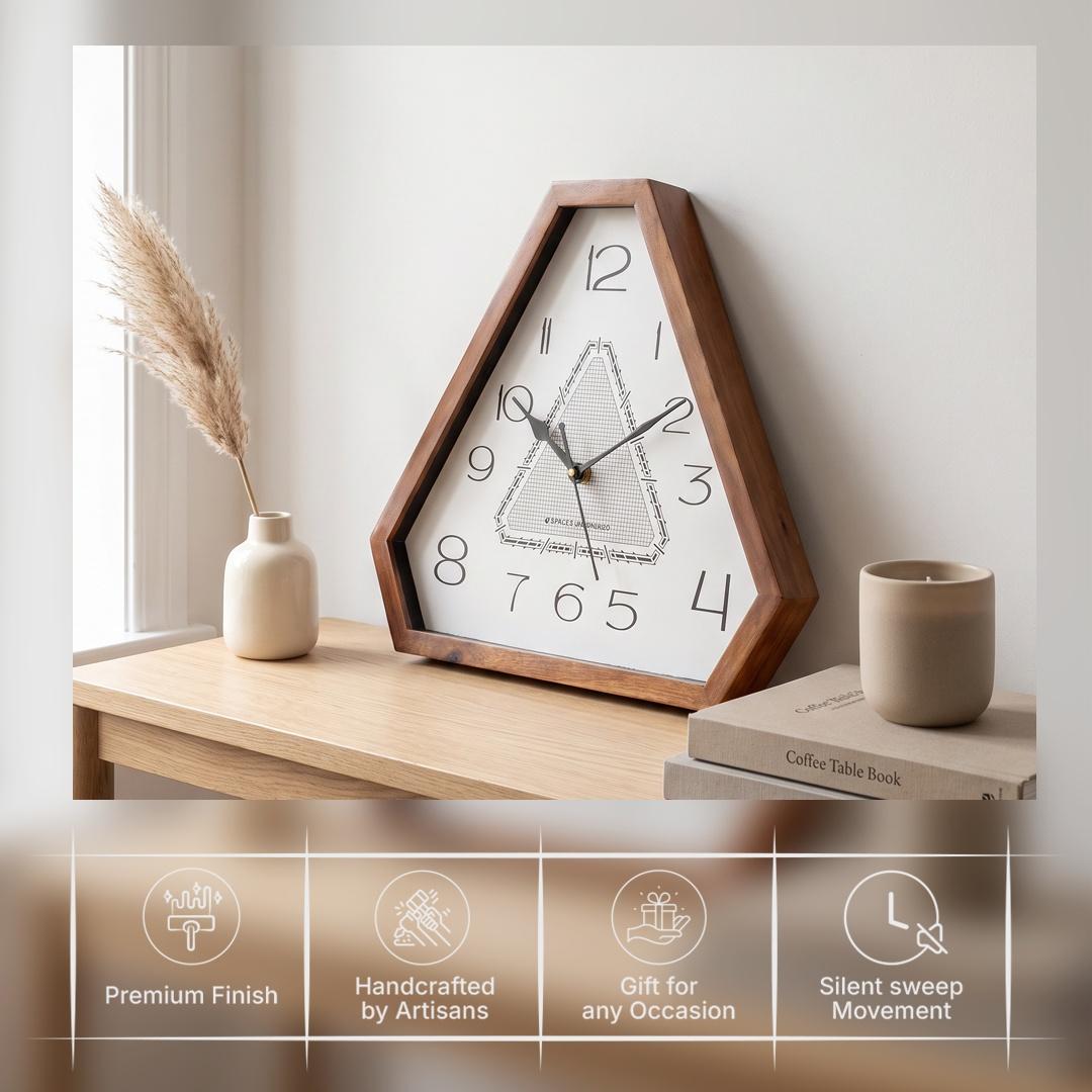 Slim elongated black numerals 1 to 12 on the white dial of a triangular wooden wall clock