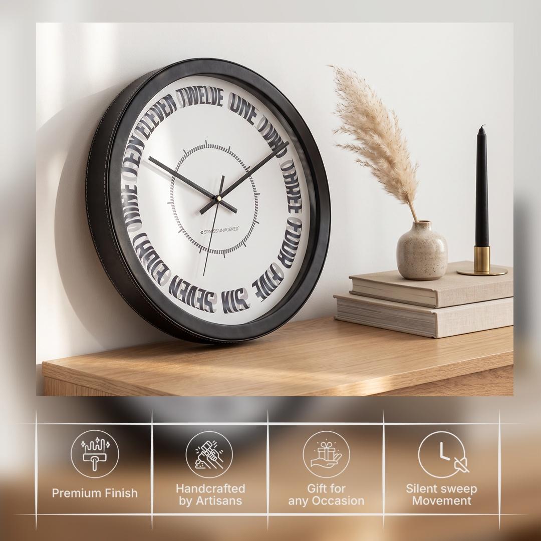 Spaces Unhooked Round Wall Clock, Curved Number Words, Black Frame