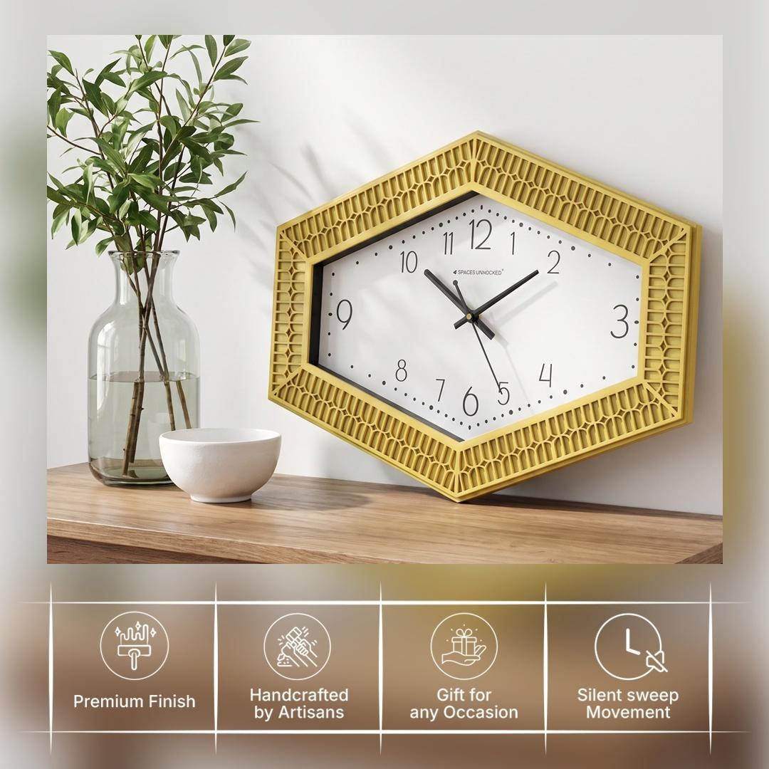 Hexagonal yellow wall clock on a bedroom wall above a dresser