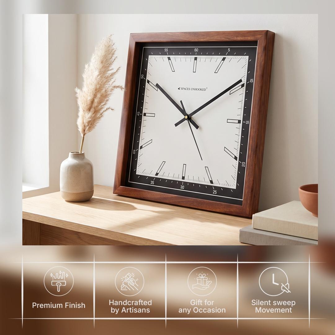 Bar-style hour markers and fine minute lines on the white dial of a square wooden wall clock