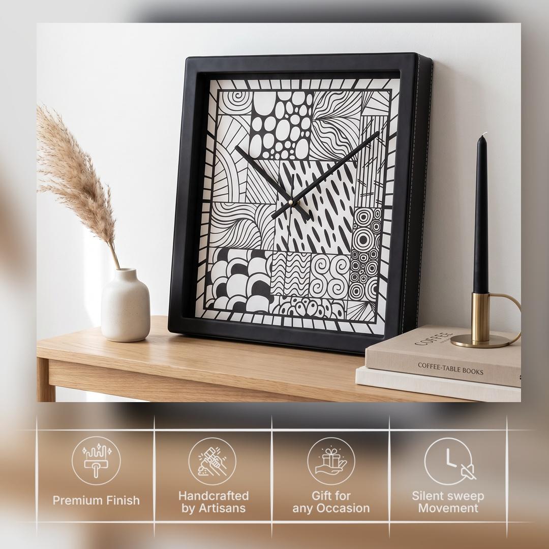 Black hour and minute hands over black and white doodle patterns on a clock dial